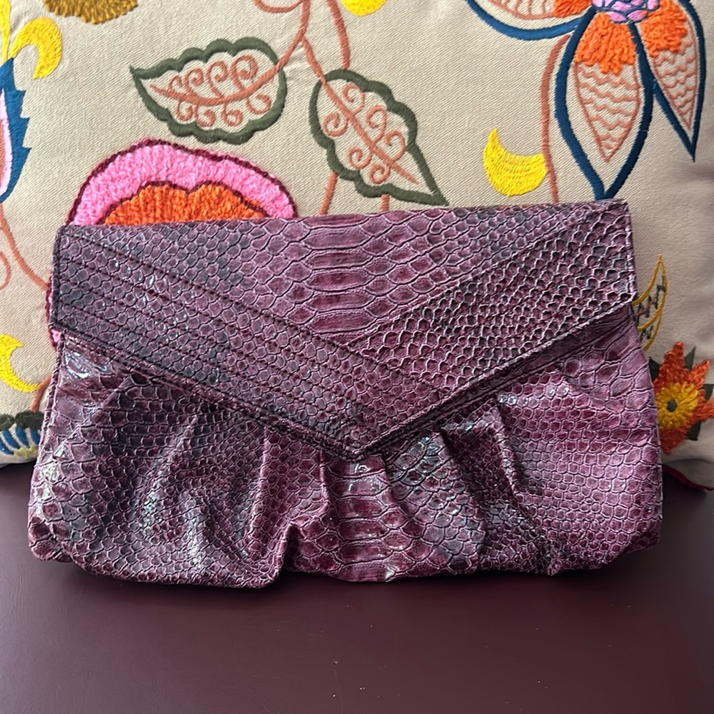 Purple faux snake skin clutch bag.  Excellent condition.